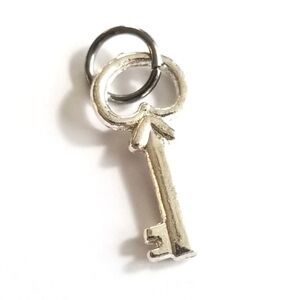 Vintage skeleton key charm tiny pendant silver tone steampunk Victorian style